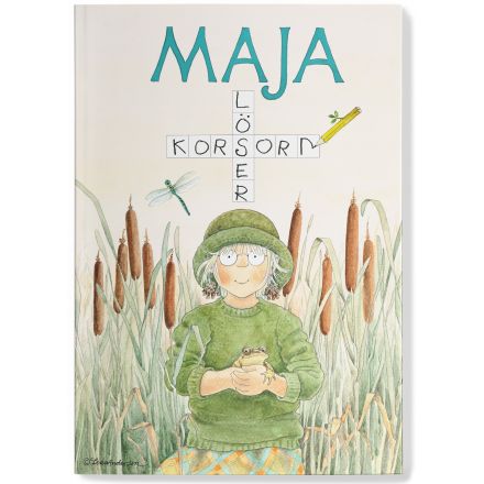 Maja löser korsord