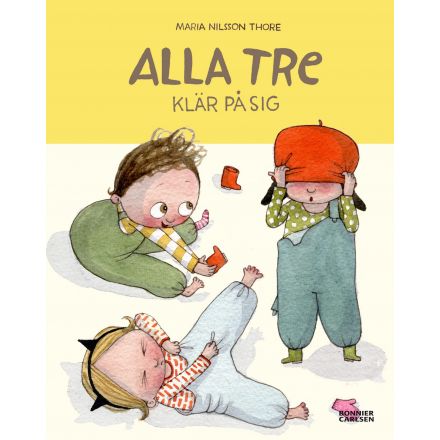 Alla tre klär på sig